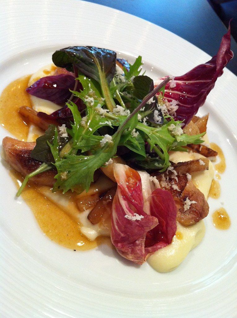 A seafood dish plated and ready to serve